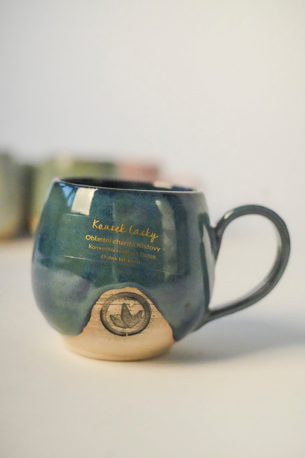 LETITROLL Hrneček s ouškem zelenomodrý